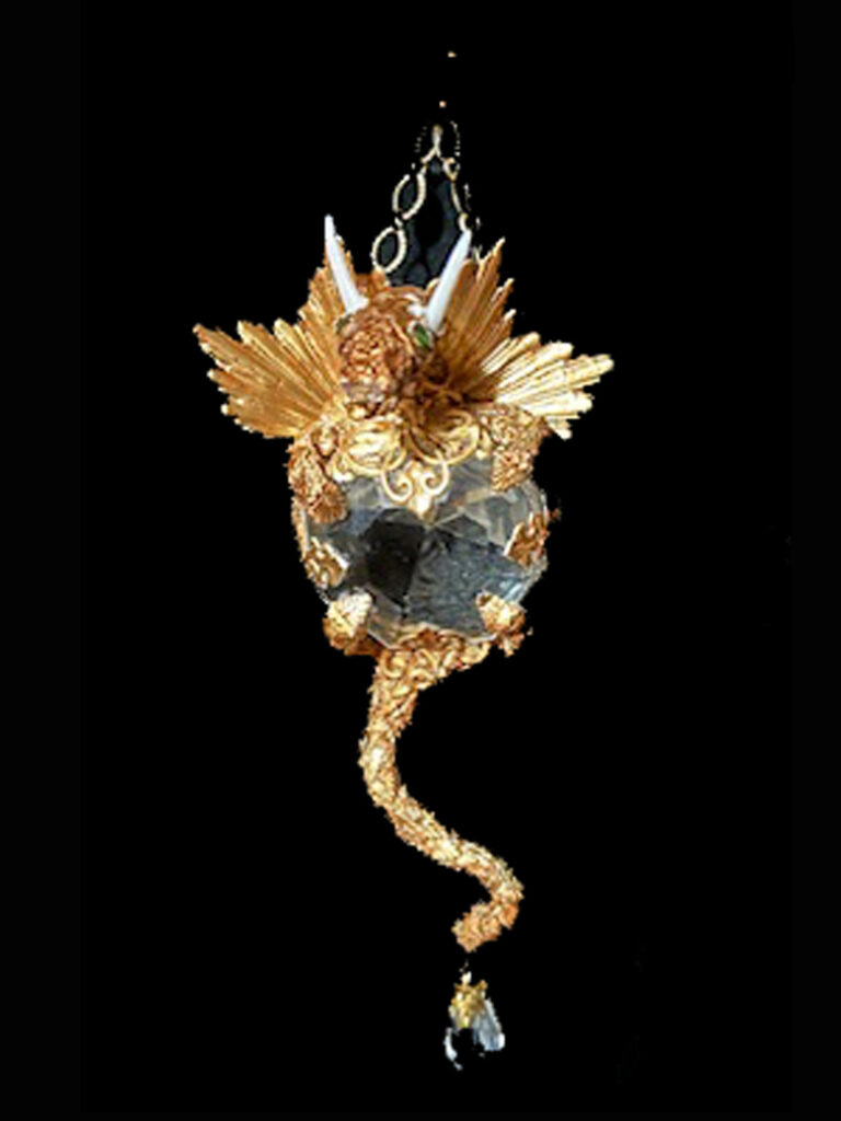 Dragon Pendant with a gold color and a clear crystal